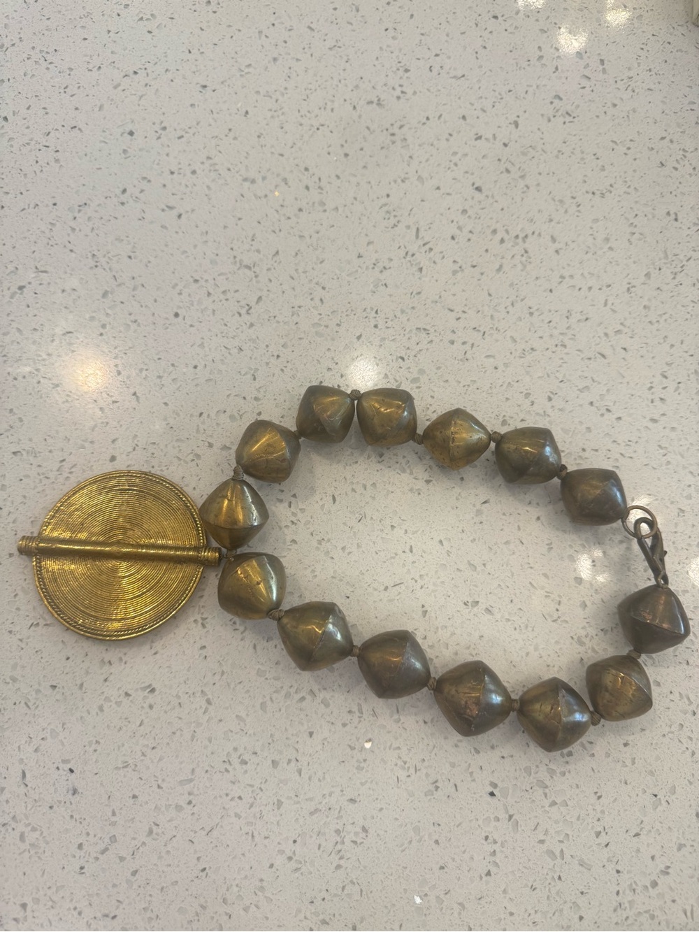 Gold-Tone Beaded Statement Necklace with Round Toggle Pendant